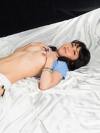 Colorful beauty Reo Saionji showing her pussy and being all sexy on a bed