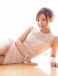 Mio Yoshida lifts up her legs to show off those divine feet on the floor