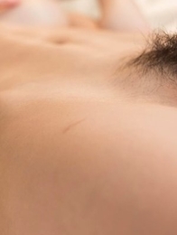 Hairy pussy hottie Shino Aoi gets eagerly finger-blasted while chilling on a bed