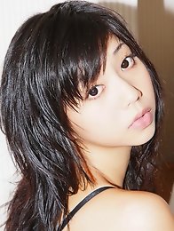 Beautiful gravure idol with milky white skin in silky lingerie