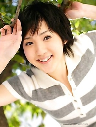 Flirtarious Japanese goddess Uran Minami poses spicy