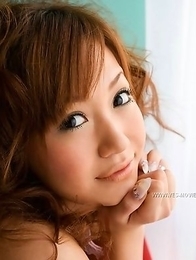 Innocent smile of a big-breasted oriental beauty Nana Konishi