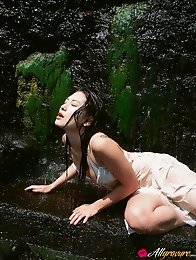 Captivating asian goddess seduces in her skimpy black bikini