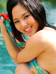 Japanese mademoiselle Soia Aoi holds up her her natural boobies