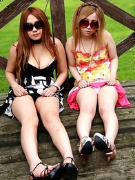 Cute Japanese babes pose outdoors