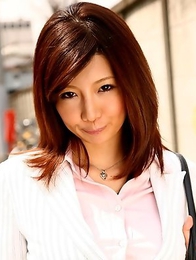 Petite Sayuri Mikami poses outdoor