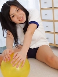 Miho Takai in sports outfit is sexy while playing with ball