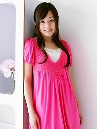 Beautiful gravure idol is adorable in cute little pink dress