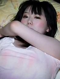 The more Rina rubbed her nipples the bigger her eyes became.