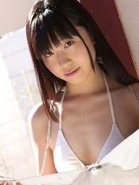 Hijiri Sachi in shorts and bra enjoys sun on her curves