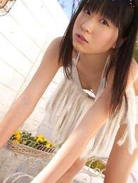 Hijiri Sachi in shorts and bra enjoys sun on her curves