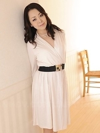 Yuna Yamami plays with big boobs and spreads