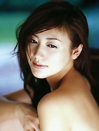 Megumi Yasu Asian cutie showing off her hot body in a bikini