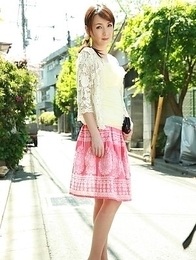 Asian Chika Sasaki in pink and yellow outfit