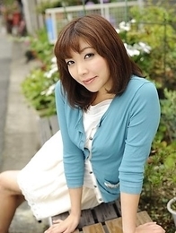 Juri Kitahara in blue sweater and lace skirt