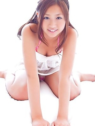 Ayaka Sayama Japan smiles while revealing curves in red lingerie