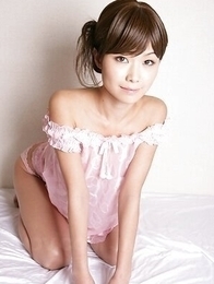 Nanako Takeuchi is so sensual in pink lingerie and she shows her tits.