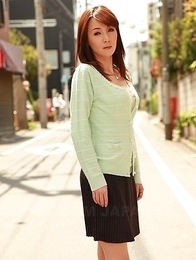 Chika Sasaki in green sweater and short skirt