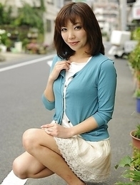 Juri Kitahara in blue sweater and lace skirt