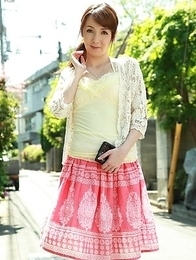 Asian Chika Sasaki in pink and yellow outfit
