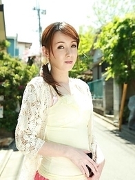 Asian Chika Sasaki in pink and yellow outfit