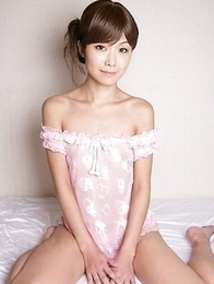 Nanako Takeuchi is so sensual in pink lingerie and she shows her tits.