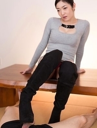 Dress-wearing classy seductress Ryu Enami using her feet to get this dude to cum