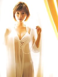 Beautiful asian goddess shows off her delicious body in a bikini