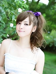 Gorgeous snow white asian beauty allures with her big brown eyes