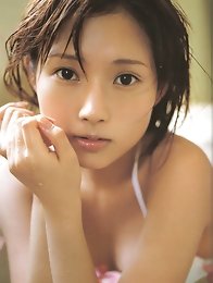 Beautiful asian goddess shows off her delicious body in a bikini