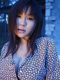 Big breasted asian angel shows off her curvy form in a bikini
