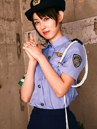 Rina Akiyama in police woman uniform exposes sexy legs
