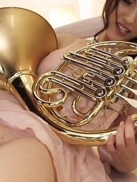 A fan fucks Kanako Iioka with his fingers while playing the horn