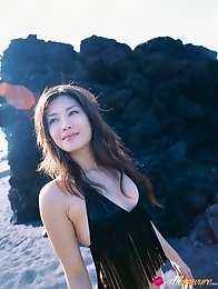 Captivating asian goddess seduces in her skimpy black bikini
