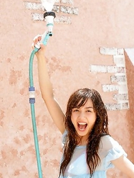 Rola Chen plays with outdoor shower on body over lingerie