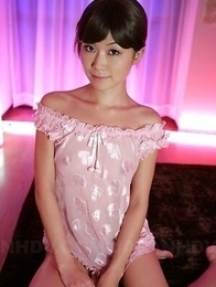Nanako Takeuchi is so sensual in pink lingerie and she shows her tits.