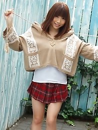 Honami Uehara posing her natural big tits in several outfits