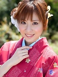 Yuna Asami wearing a beautiful traditional dress covering her big tits