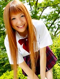 redhead japanese girl Hinano Momosaki in school uniform outdoors
